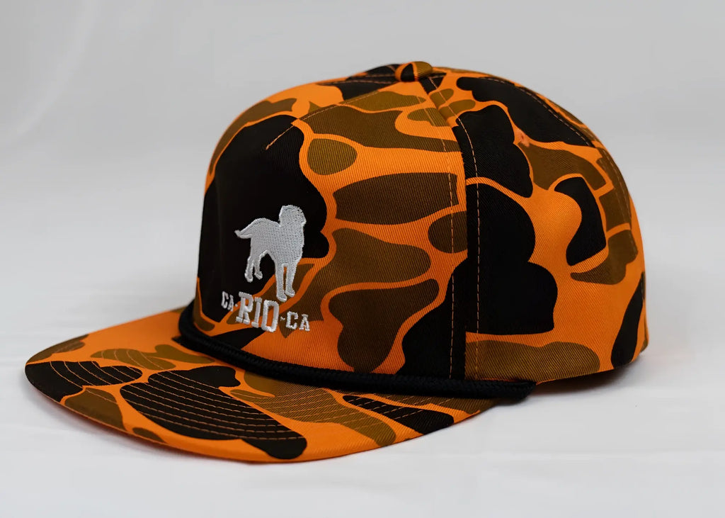 Old school camo unstructured rope hat orange and black camouflage baseball cap with silver embroidered dog logo and text