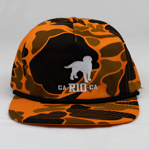 Orange and black camouflage unstructured snapback cap with silver embroidered dog silhouette and ca-rio-ca text