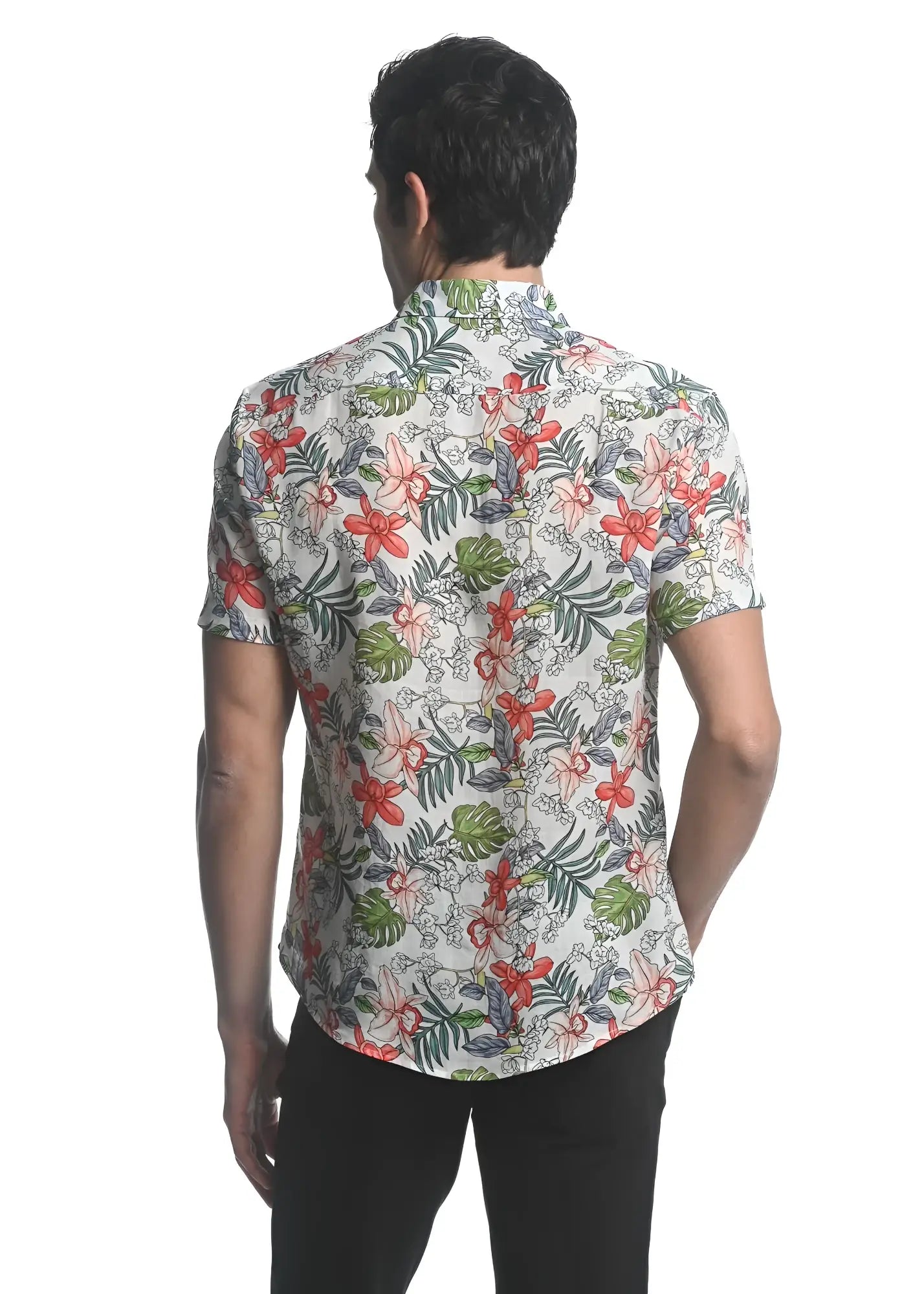 A man wearing an orchids tencel linen short-sleeved woven shirt with red green and gray floral pattern on off-white background