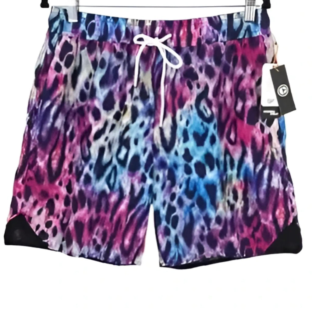Original fables swim shorts by Vans with vibrant multicolored leopard print in pink purple blue and black hues
