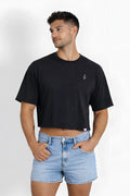 Black oversized relaxed crop top with small embroidered logo on left chest in midnight black color