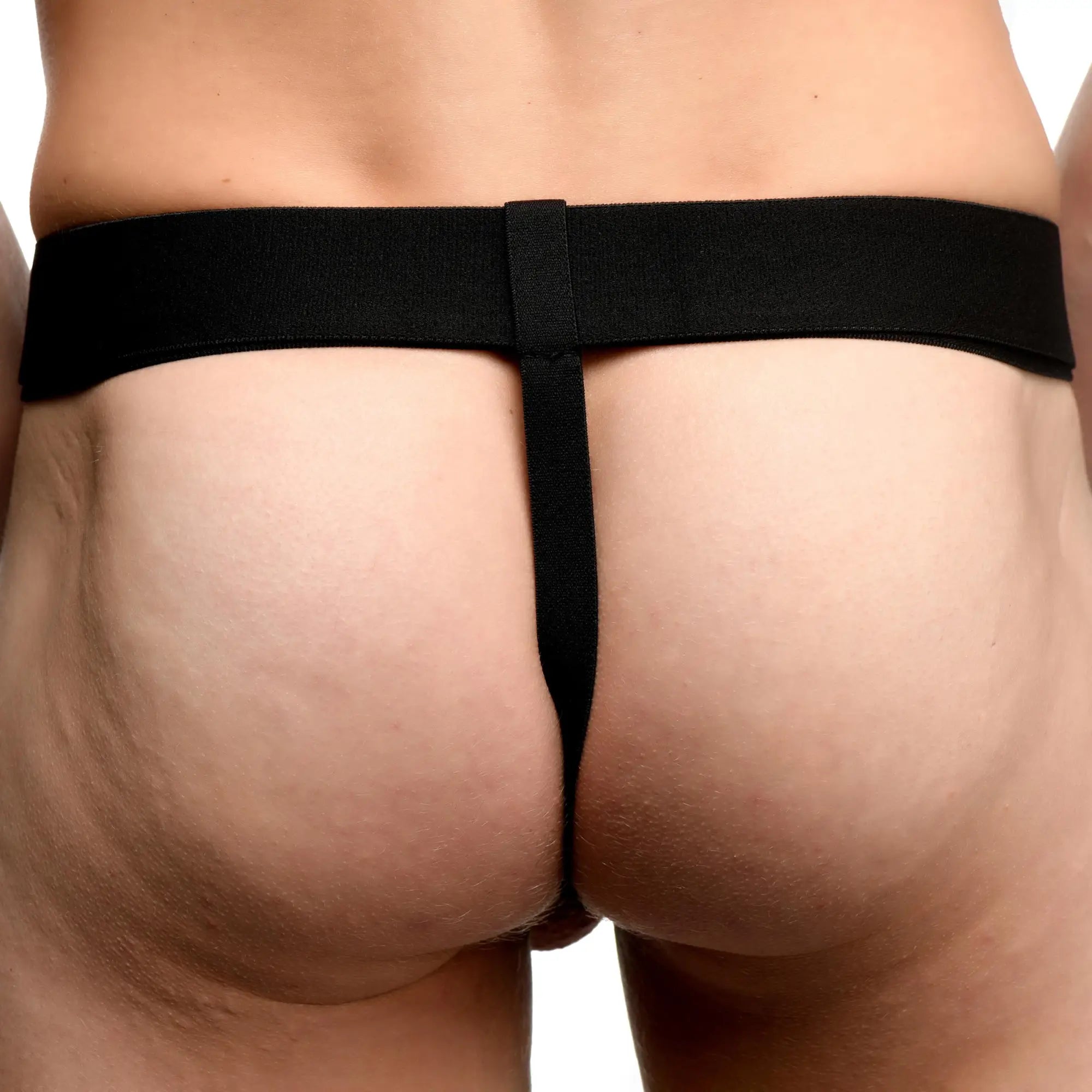 Black elastic thong with central strap and back closure for p-spot plugger trainer comfort harness with plugs back view