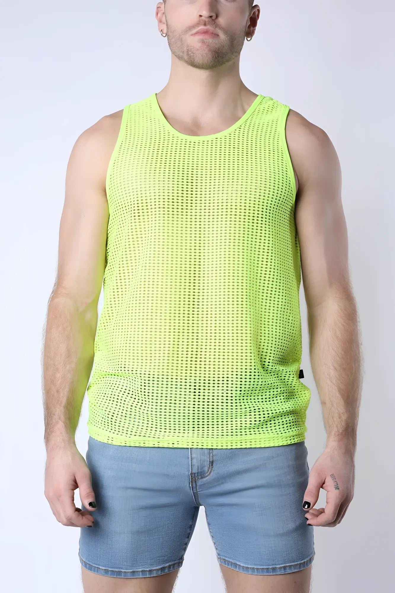 Neon green palm canyon mesh tank top made of breathable mesh fabric for activewear or casual use