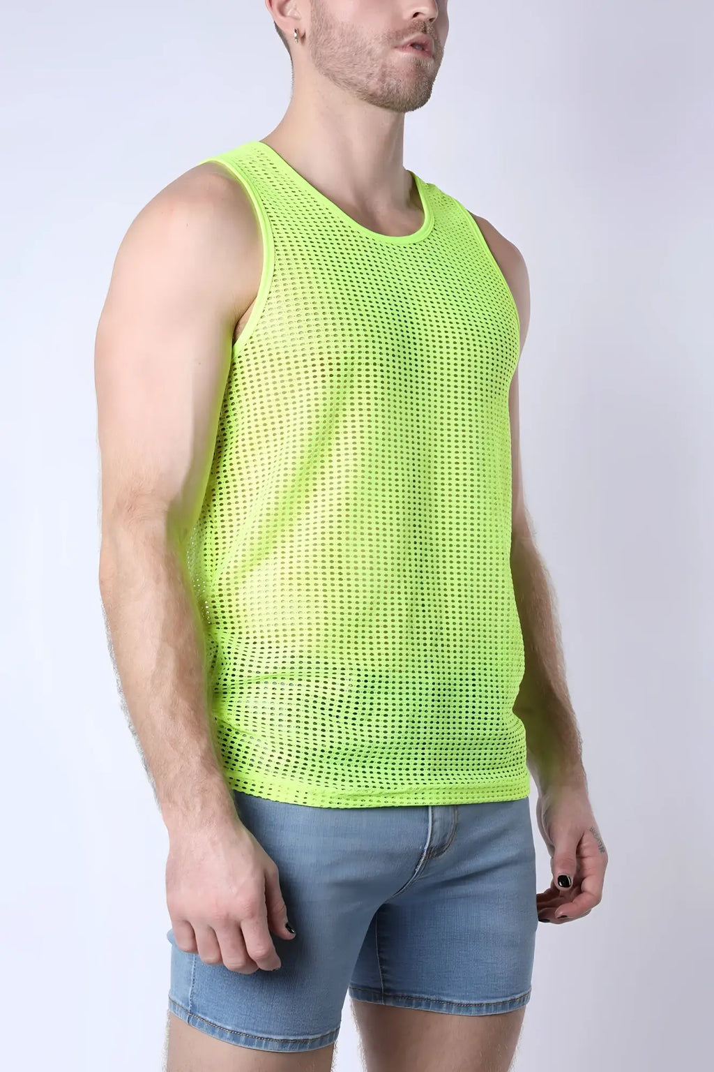 Palm canyon mesh tank top in neon green featuring a fitted silhouette round neckline and breathable mesh fabric