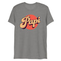 Gray heathered t-shirt with bold retro style papi graphic in beige and black on orange circular background