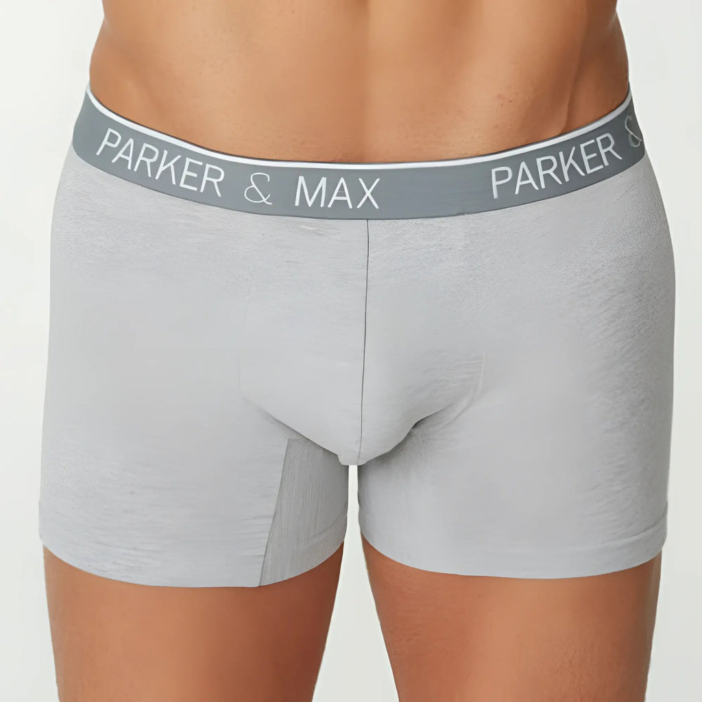 Gray heathered boxer briefs with a matching elastic waistband featuring the parker and max logo in white lettering