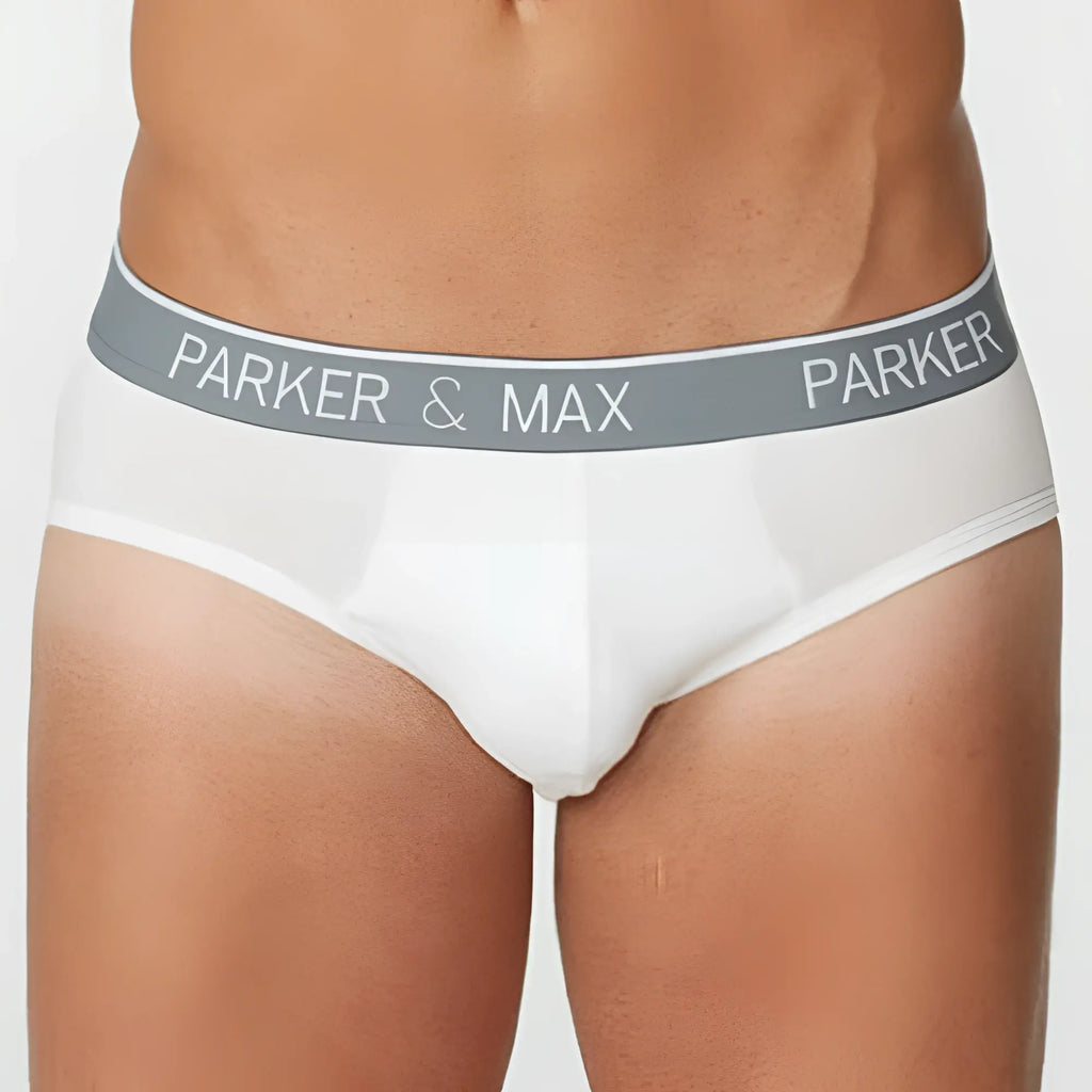 White men’s briefs with gray elastic waistband featuring parker and max logo in white lettering from parker and max