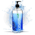 Passion 34oz Natural Water-Based Lube in a clear bottle with a black pump, set against a blue water splash effect.