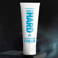 Passion Keep it Hard Stay Hard Cream in a white squeeze tube with blue text, displayed on a black pedestal.