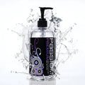 Passion Premium Silicone Hybrid Lubricant bottle with a black pump, set against a dynamic silver liquid splash effect.