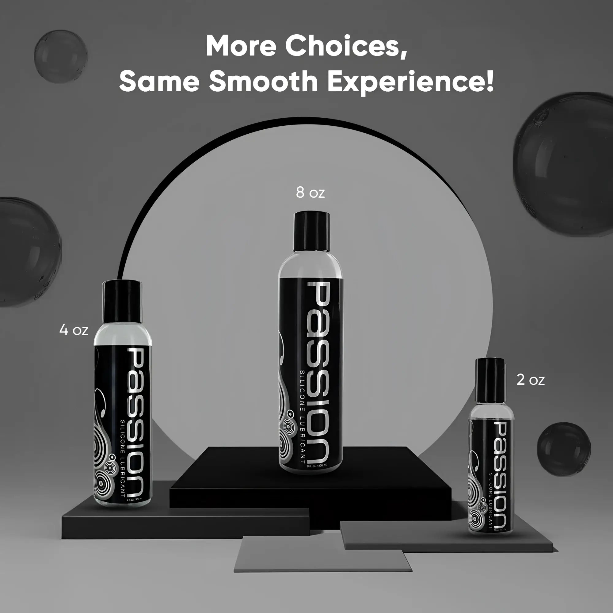 Three bottles of Passion Silicone Lubricant in 2oz, 4oz, and 8oz sizes displayed on black platforms against grey.