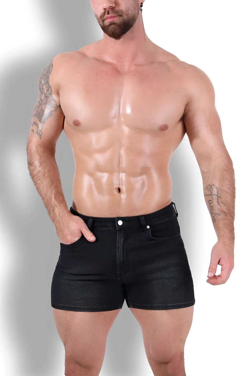 Black peek-a-boo denim shorts with classic five-pocket design and silver-toned hardware in denim material