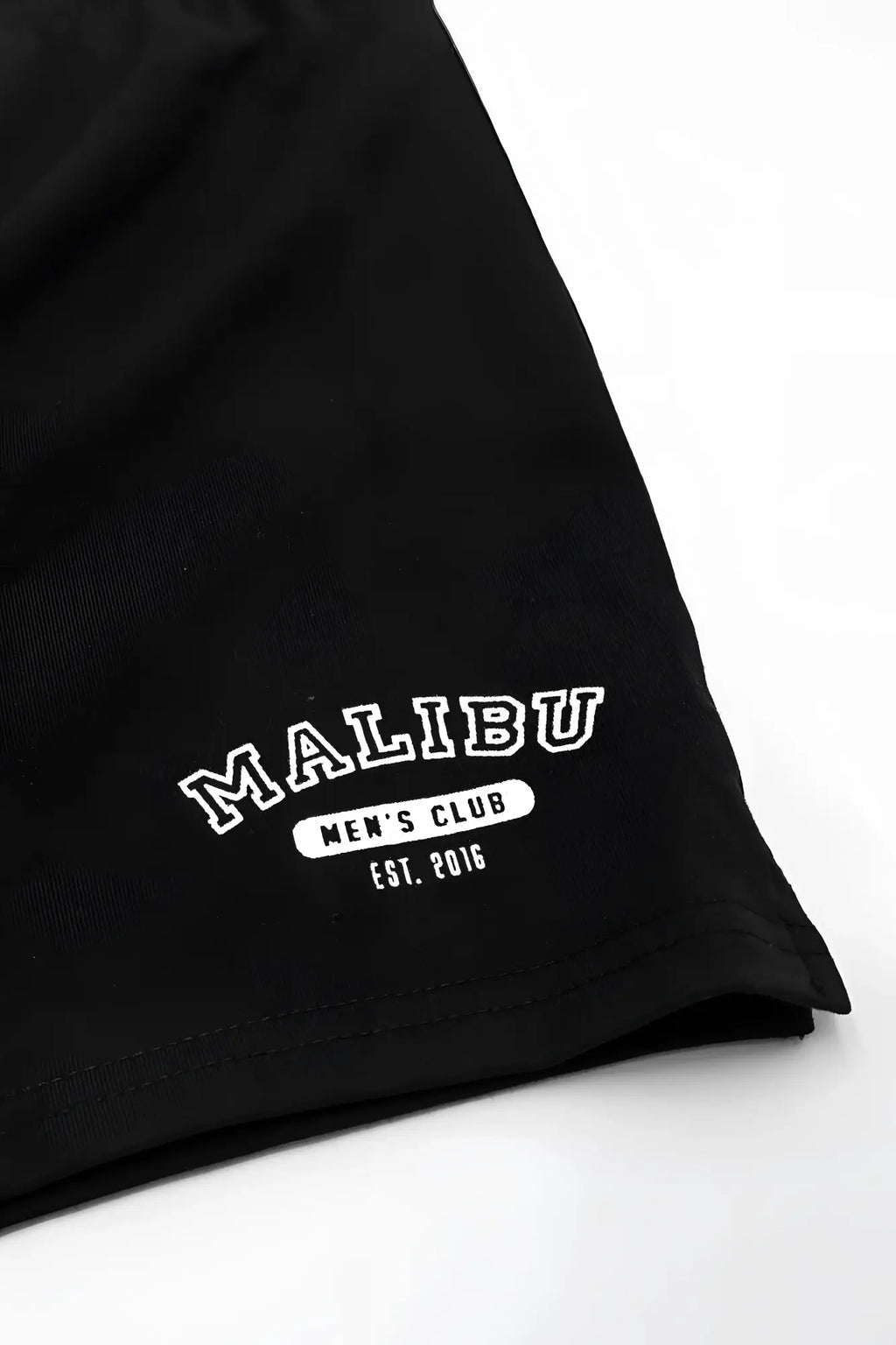 Black cotton peek-a-boo varsity 2 inch short shorts in midnight with white embroidered malibu men’s club est design