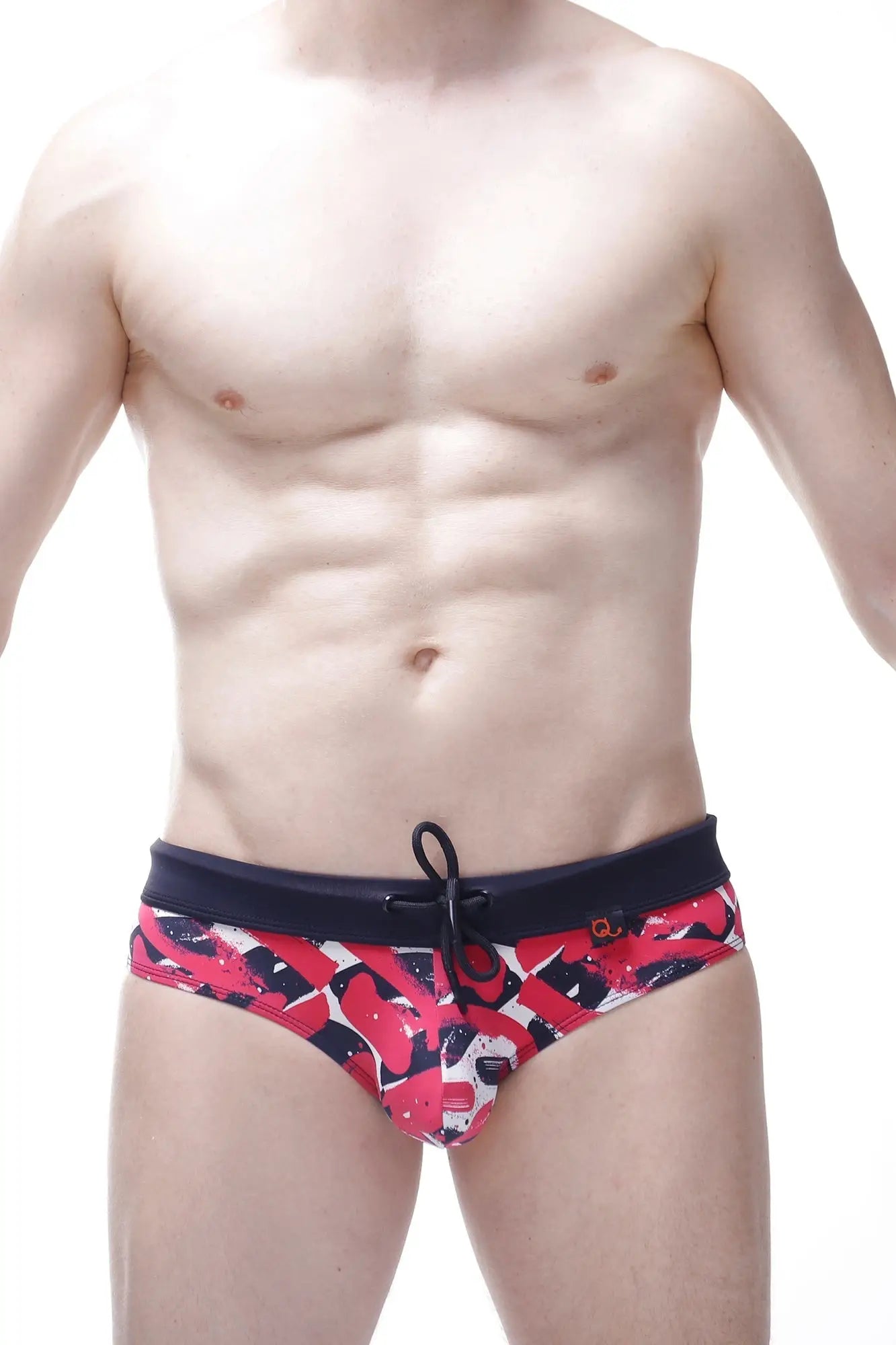 PetitQ bikini ajoupa chick red and black abstract patterned swim trunks with solid navy waistband for beachwear