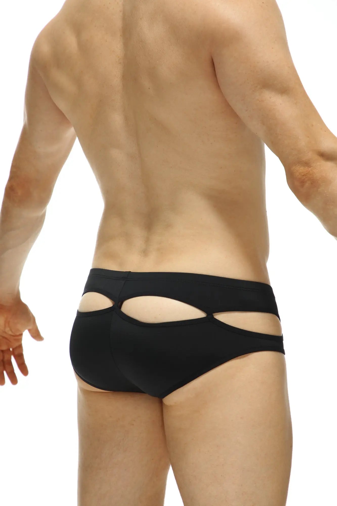 Black cut-out swim trunks from PetitQ Bikini Carlat black featuring a sleek modern design