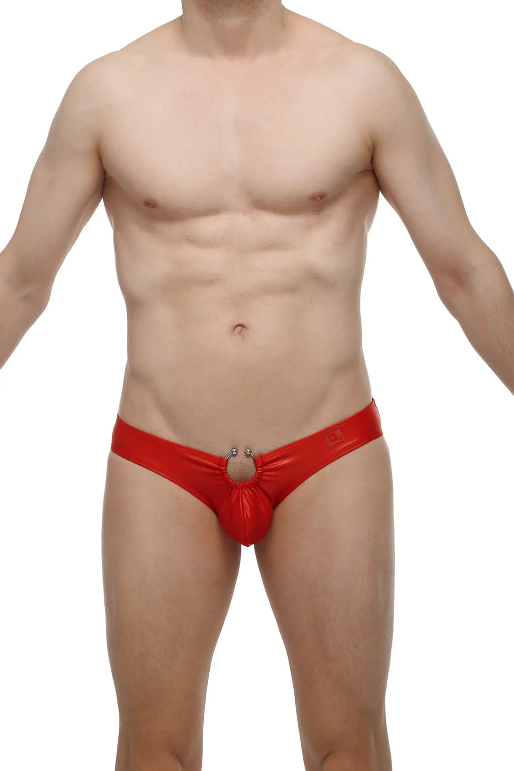 Red shiny latex thong with central ring detail from petitq bikini cuxac red collection front view