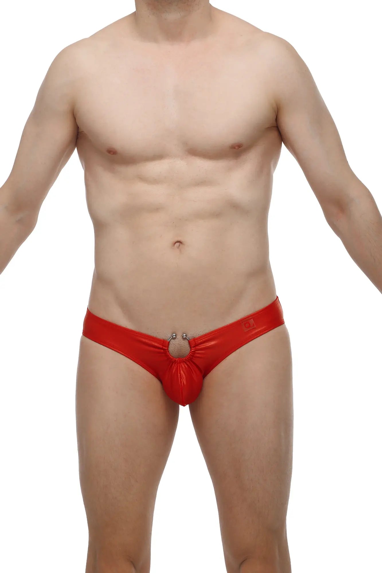 Red shiny latex thong with central ring detail from petitq bikini cuxac red collection front view