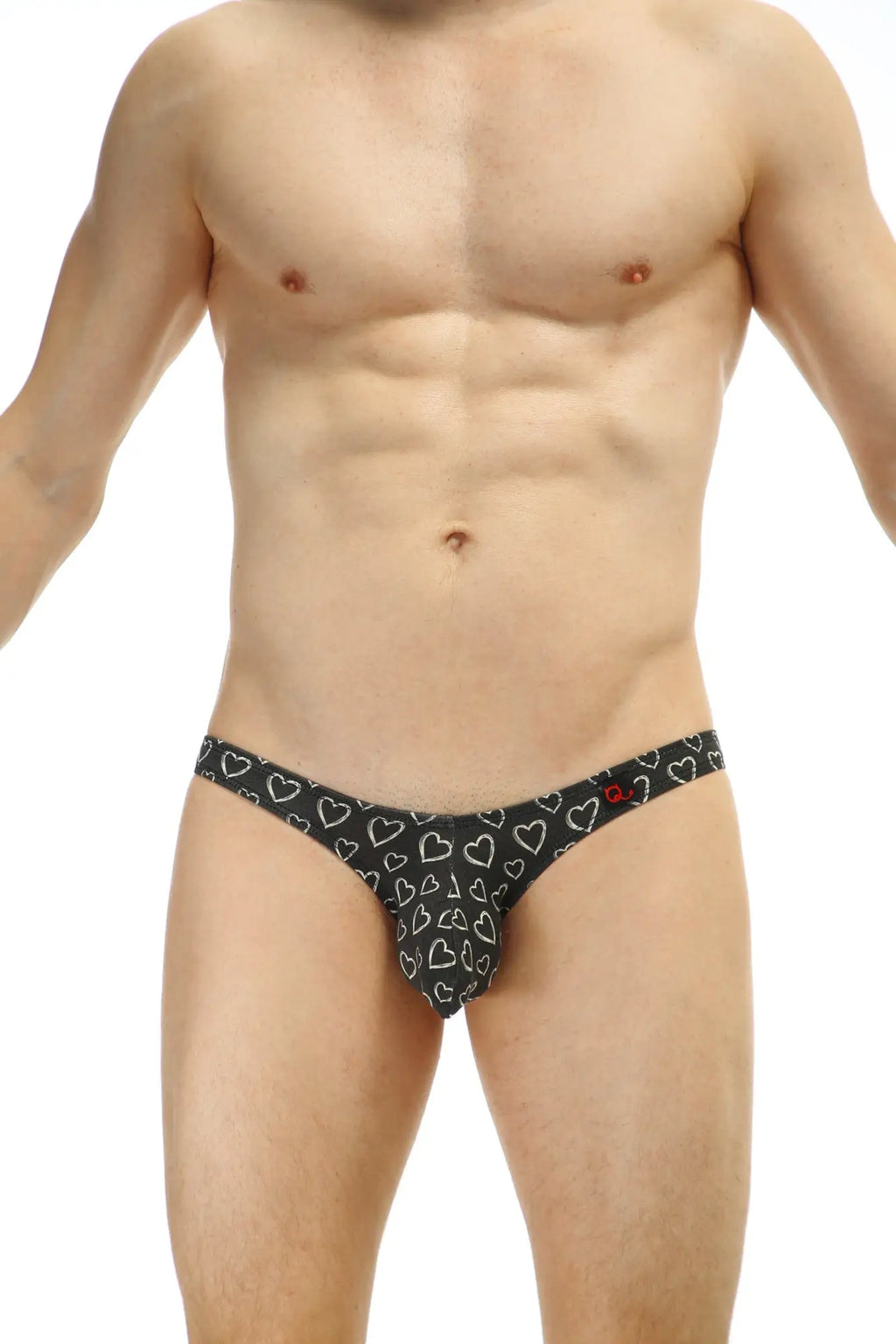 Black thong with white heart pattern from petitq bikini dumbo coeur featuring a playful print design