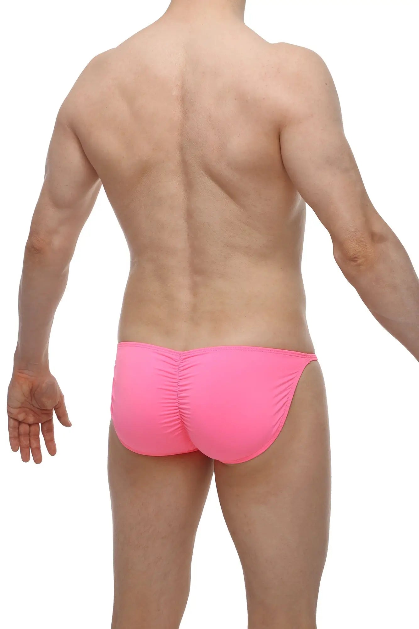 Bright pink bikini lhery bulan swim trunks with a ruched back design and form-fitting style shown from the back