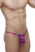 PetitQ bikini plellis tropical hearts men’s thong in vibrant pink and navy blue tropical leaf pattern