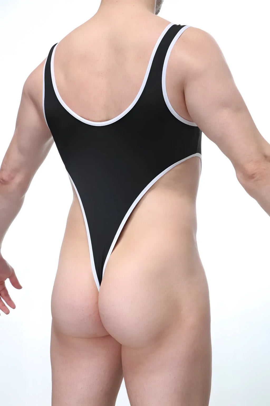 Black one-piece swimsuit PetitQ Bodythong Carbay black with white trim along neckline armholes and leg openings