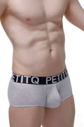 Gray textured cotton boxer briefs with black elastic waistband featuring petitq logo in white lettering