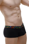 Black petitq boxer coudoux stars briefs with colorful rainbow star pattern on waistband for casual wear