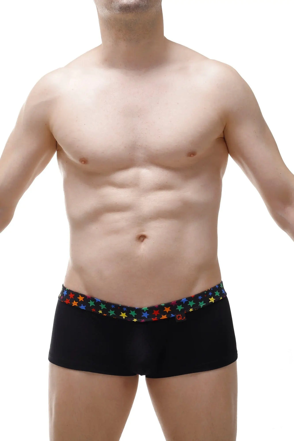 Black PetitQ boxer coudoux briefs with a colorful star-patterned waistband made from soft breathable fabric