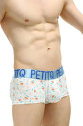 White men’s boxer briefs with orange and teal candy cane pattern and light blue petitq elastic waistband for comfort