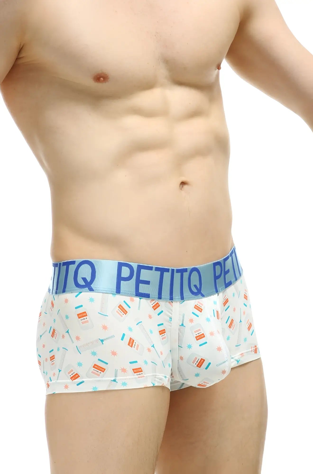 White men’s boxer briefs with orange and teal candy cane pattern and light blue petitq elastic waistband for comfort