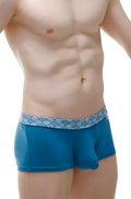 Blue petitq boxer meljac wave men’s briefs with white wave-patterned waistband designed for comfort and style