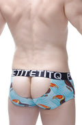 Light blue petitq boxer brief with toucan and palm leaf pattern and black elastic waistband with white lettering