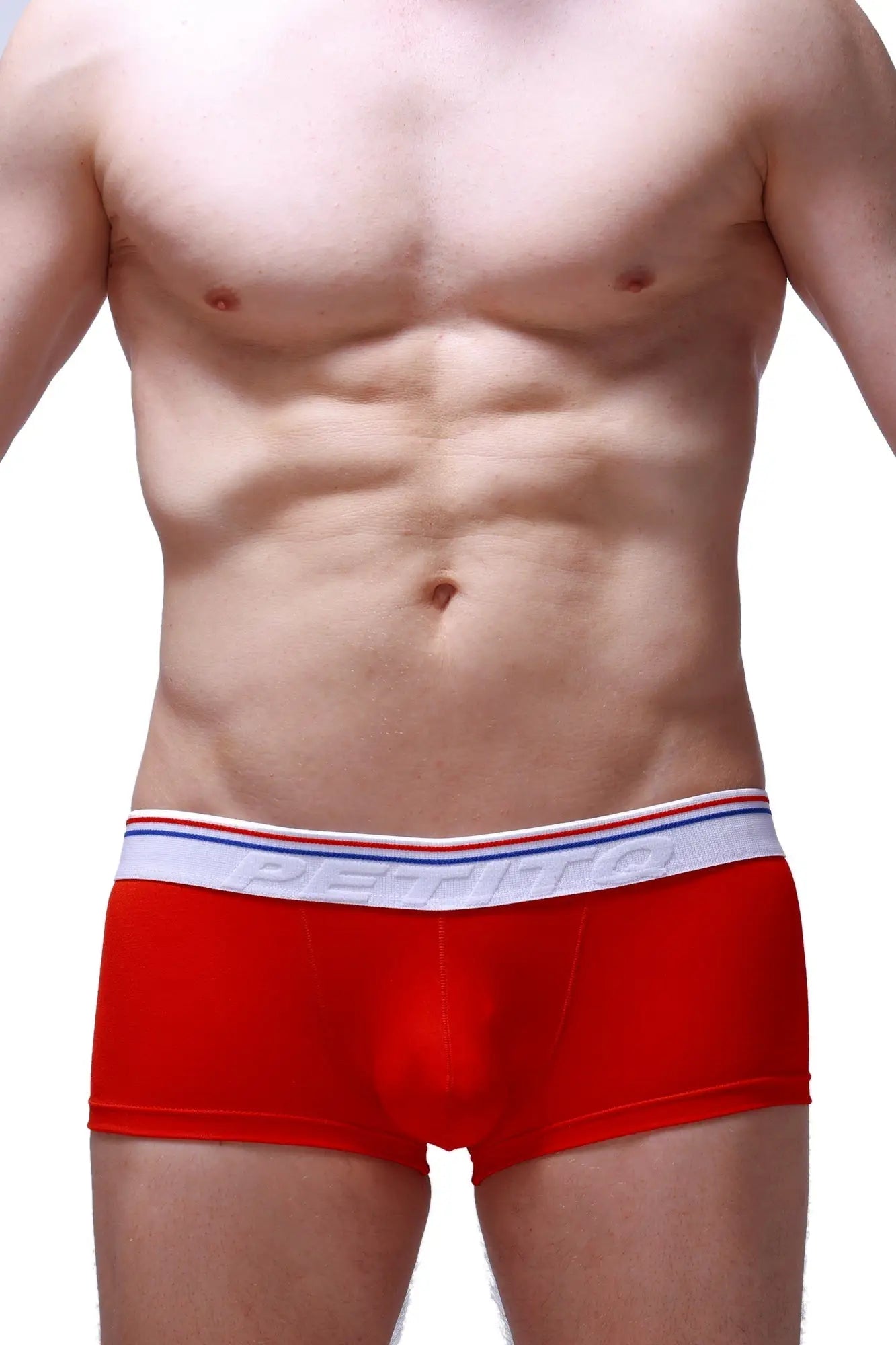Red petitq boxer push-up briefs with white elastic waistband featuring red and blue stripes and petitbag logo in gray