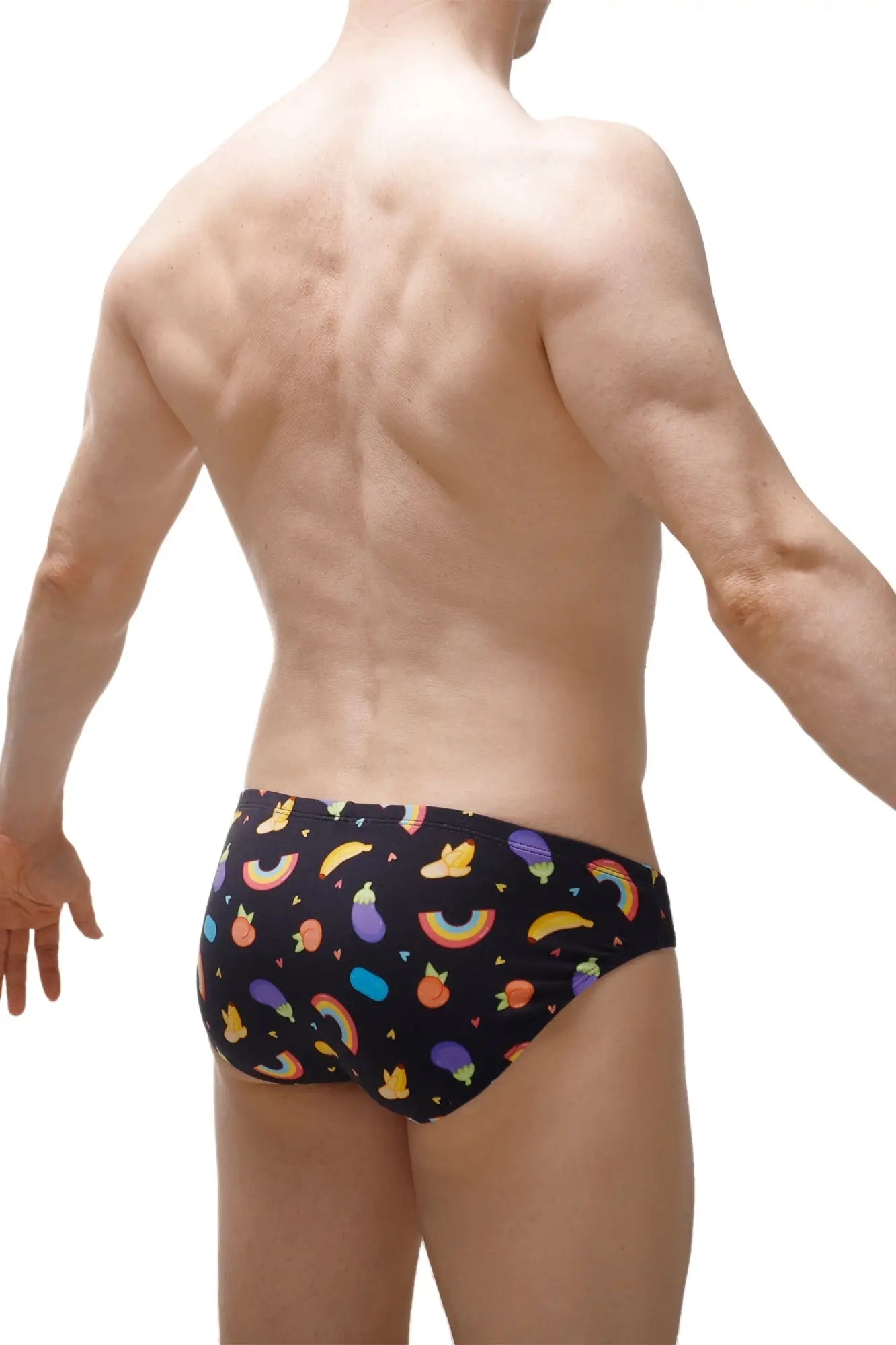 Black PetitQ brief Ansan Sitges swim trunks with colorful rainbows fruits and vegetables pattern for kids