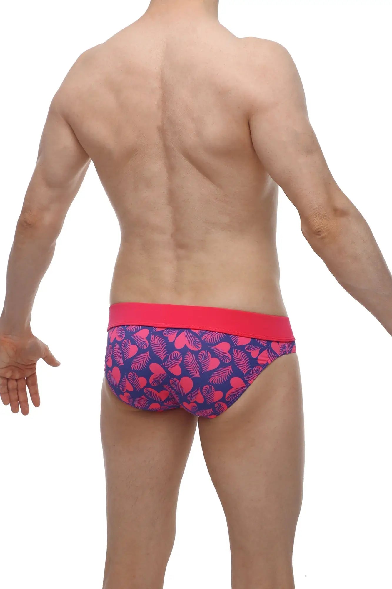Men’s PetitQ brief Blaru tropical hearts with vibrant pink and navy heart leaf pattern and solid red waistband