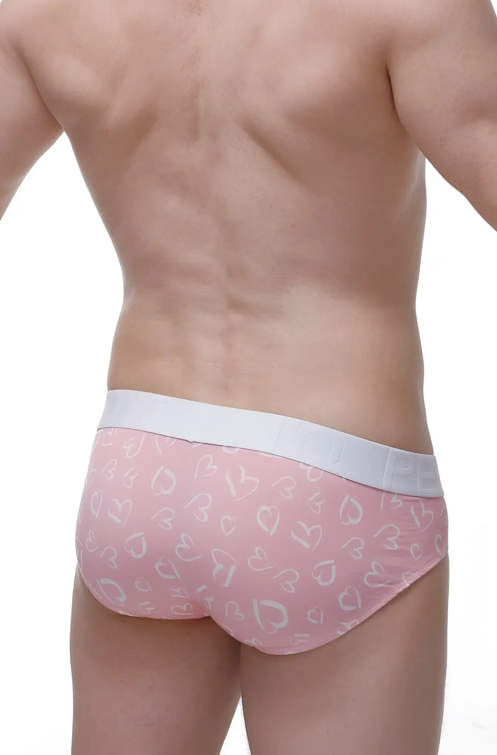 Petitq brief dome løve pink men’s briefs with white heart pattern and light gray waistband for comfortable wear