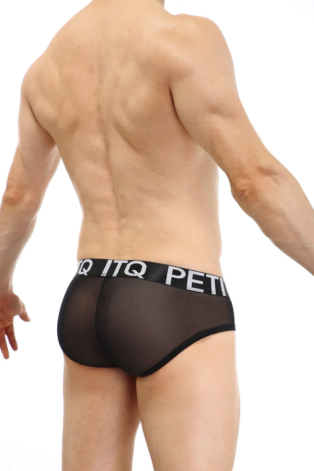 Black sheer mesh briefs with a black elastic waistband featuring white petitq lettering from petitq brief double pouch sitges