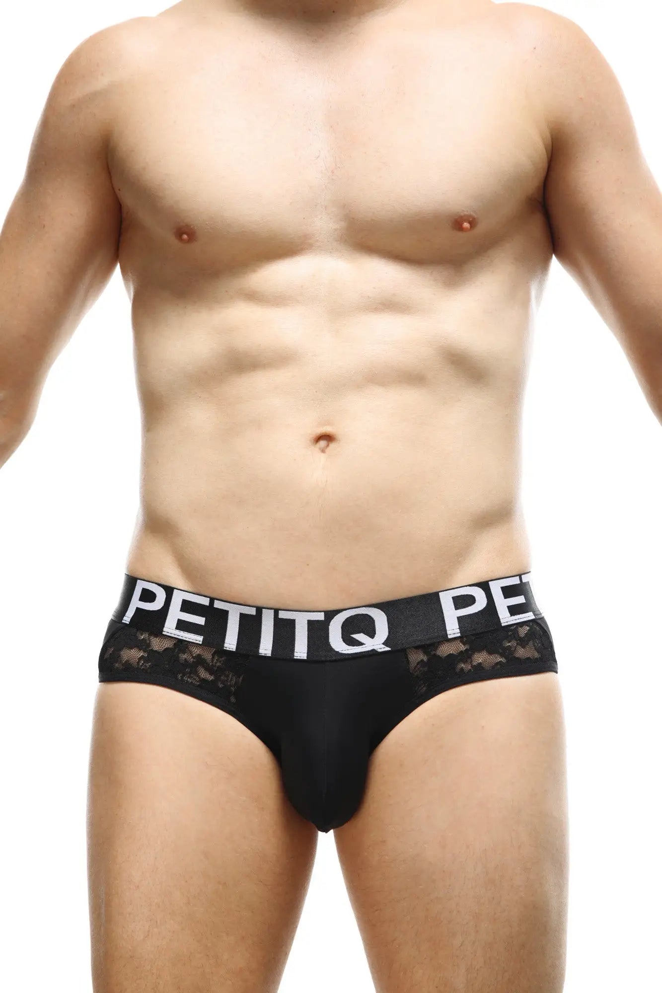 Black lace-trimmed men’s briefs with white petitq logo band in the petitq brief herm lace black collection