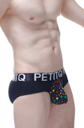 Black petitq briefs with a colorful rainbow star pattern on the pouch for vibrant everyday wear