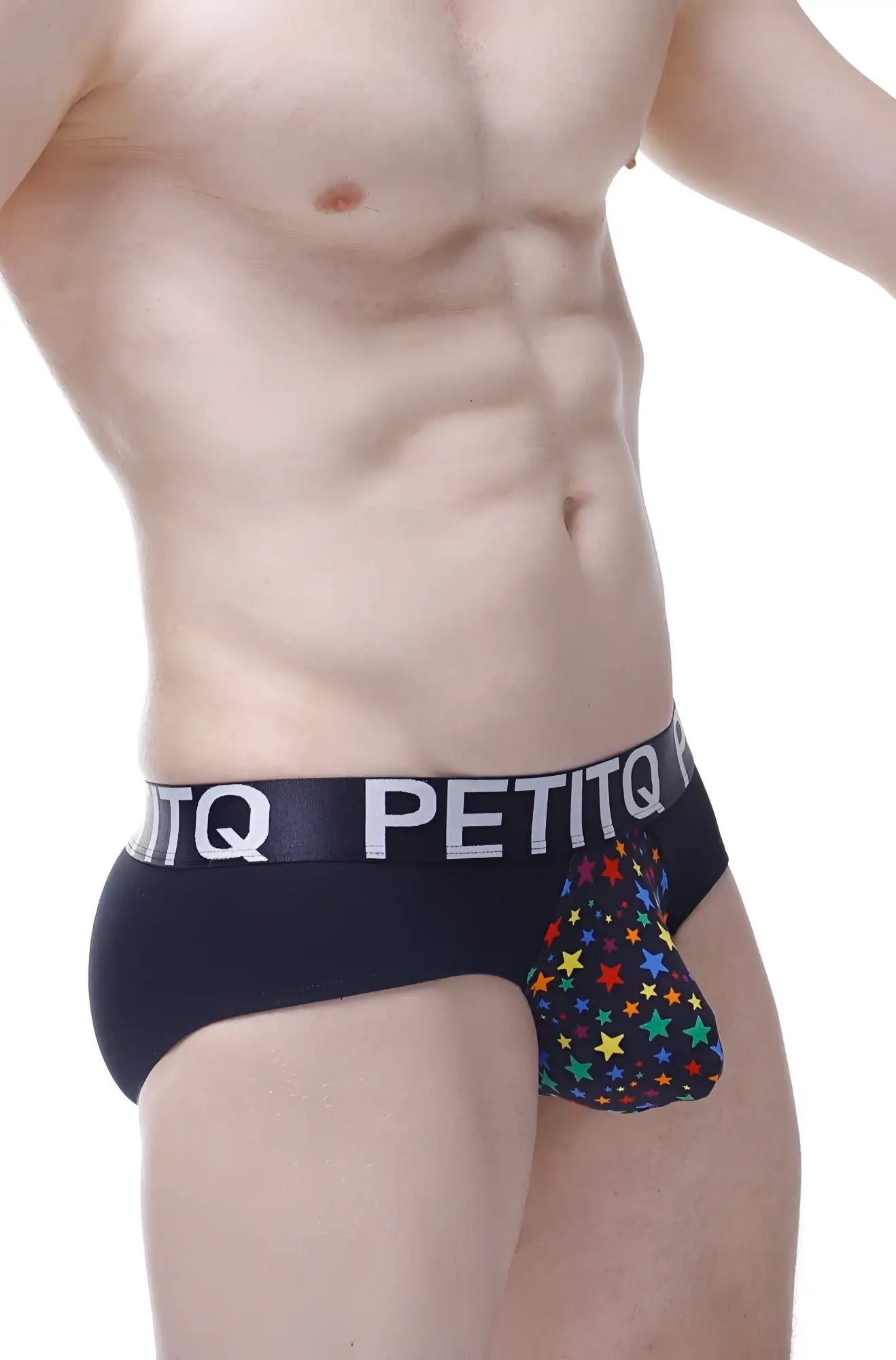 Black petitq briefs with a colorful rainbow star pattern on the pouch for vibrant everyday wear