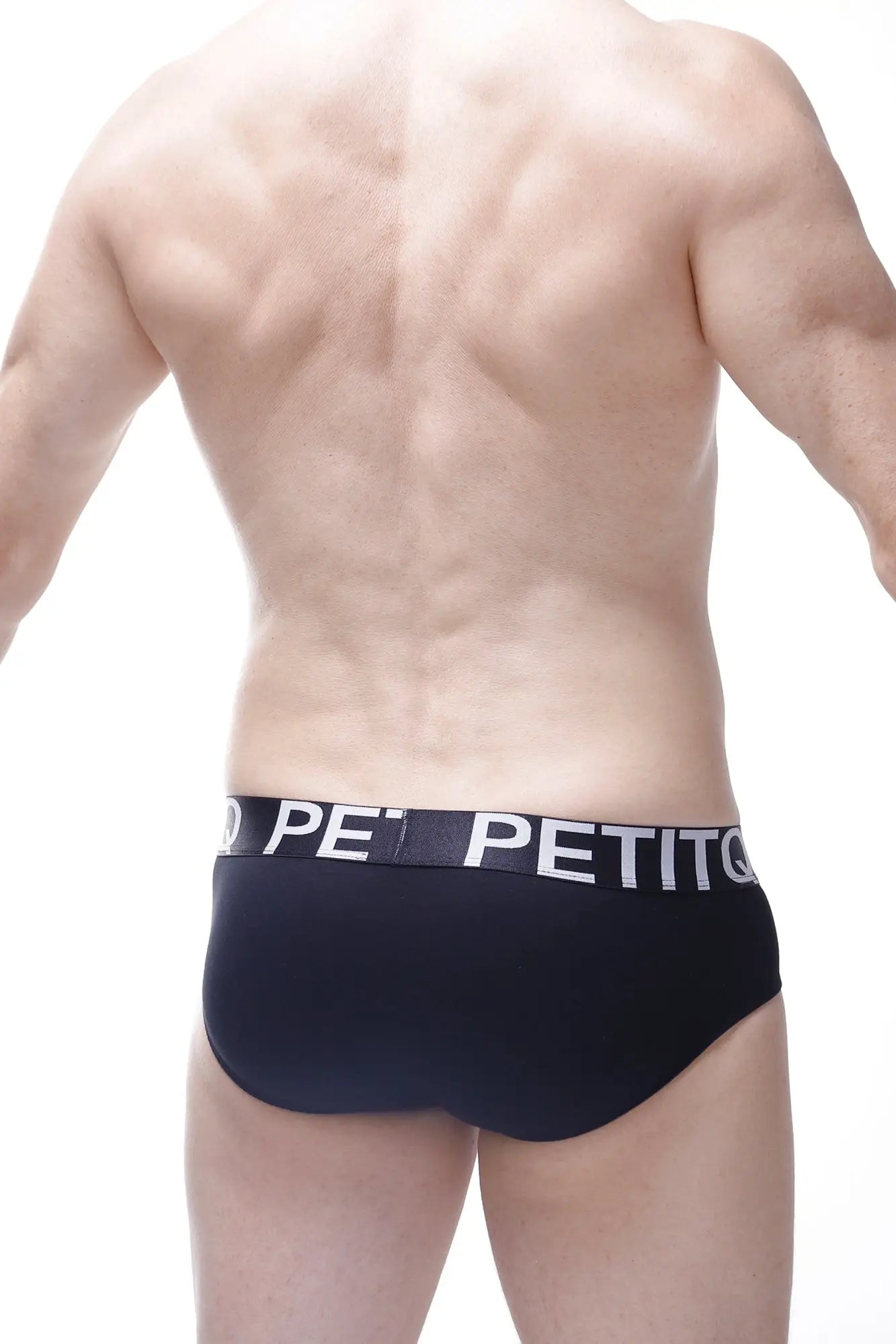 Black men’s briefs with white petit logo band featuring rainbow stars pattern for comfortable everyday wear