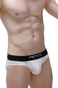White petitq men’s briefs with black waistband featuring petitq logo made from econyl for sustainable comfort