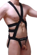 Black petitq jock harness champol bodysuit with crisscross straps and cutout design showing back side