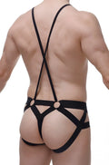 Petitq jockstring suspenbust black strappy harness briefs with crisscross back straps and metal rings shown from back