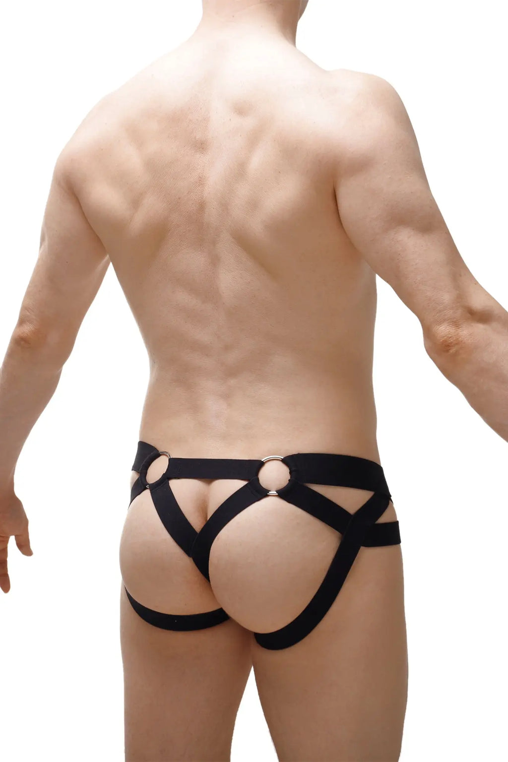 Black harness-style briefs with metallic rings at front and back by petitq jockthong bost black 2023