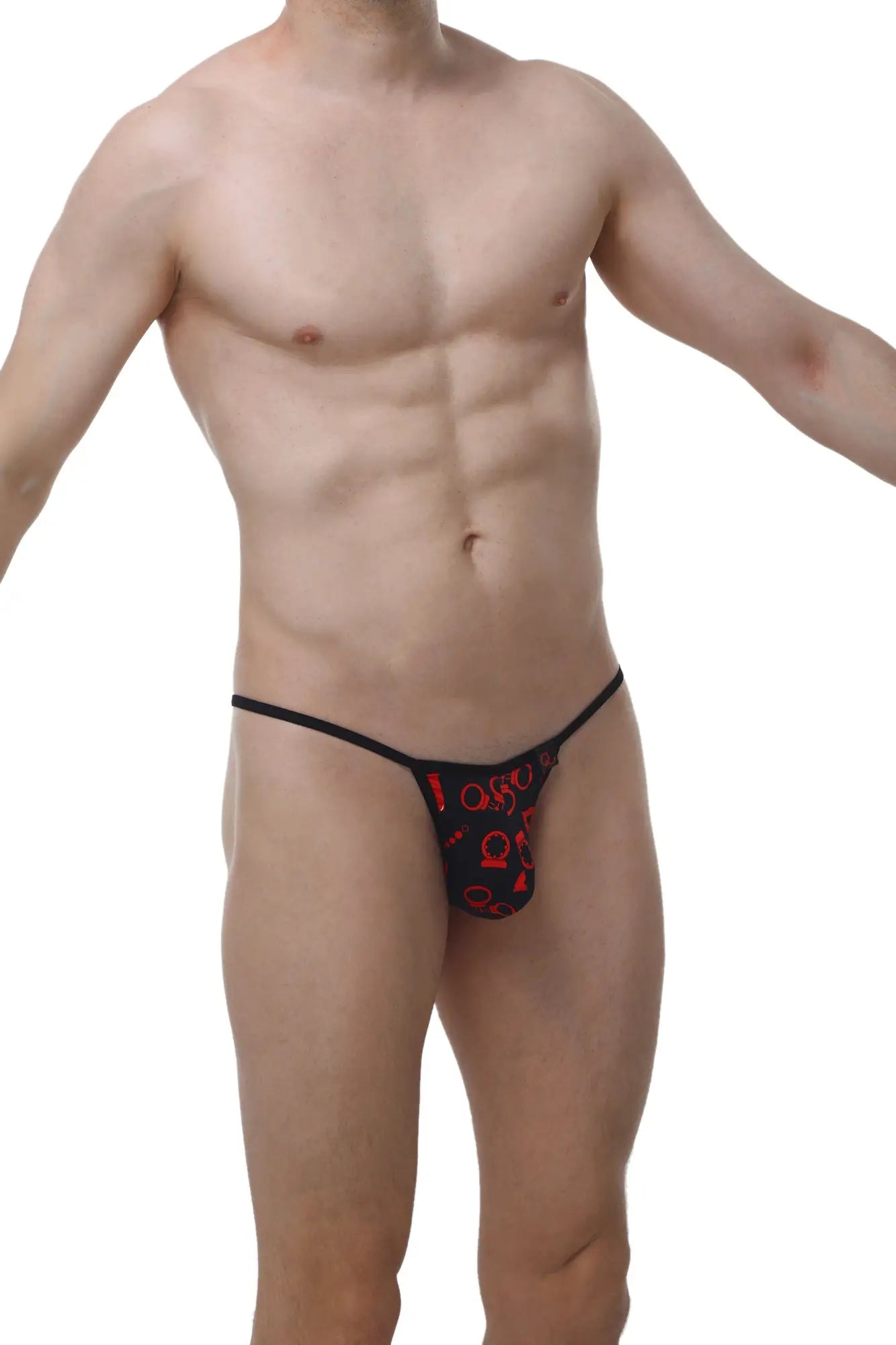 Black thong with red graphic patterns from petitq kini boudoir showing the back side in sheer fabric