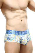 White petitq mini boxer double pouch briefs with blue green yellow abstract faces and circles and light blue waistband