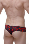 Red heart patterned men’s PetitQ mini boxer briefs on dark navy fabric made of soft stretch cotton material