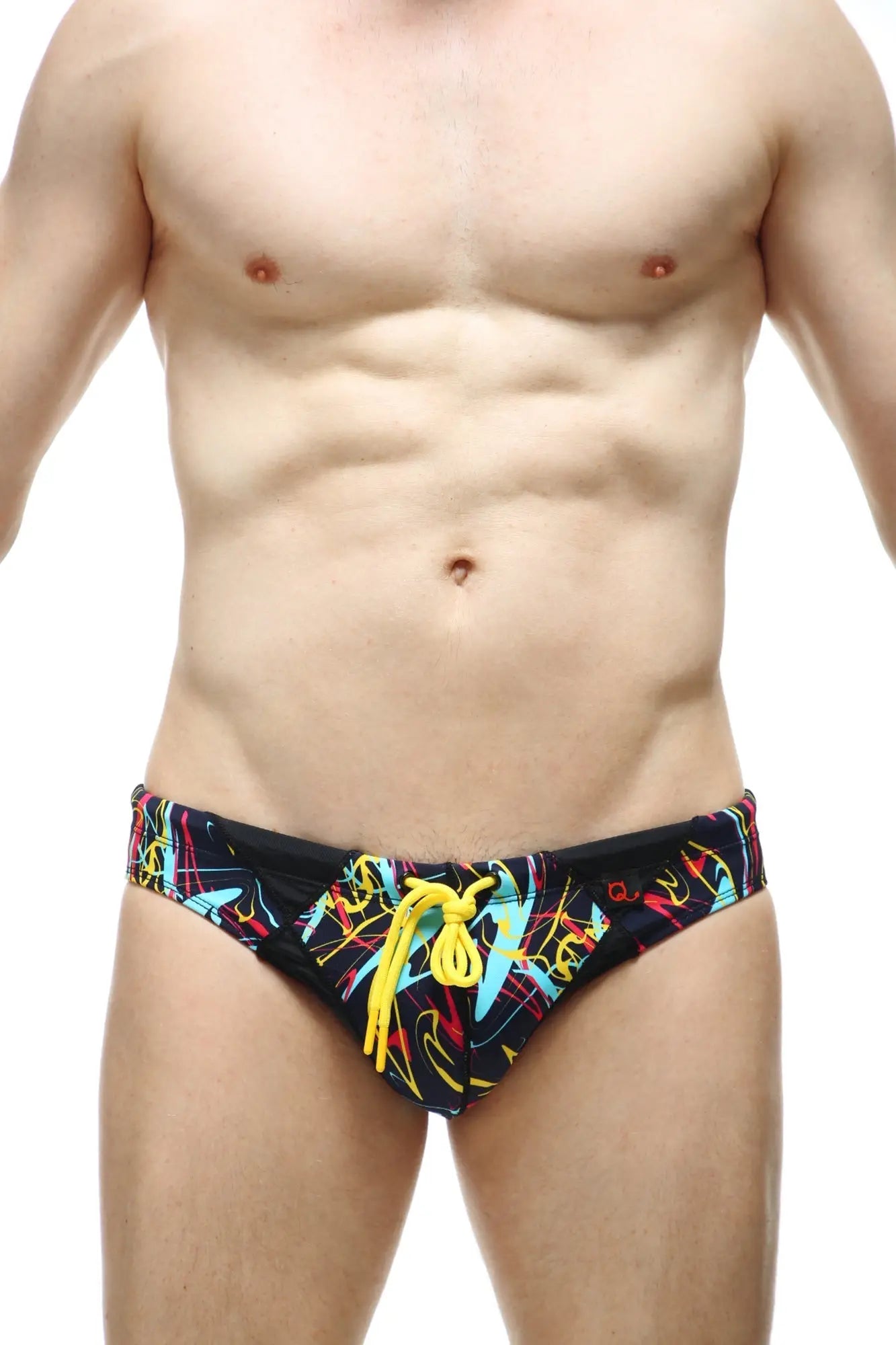 Black swim trunks petitq swim bikini lecci conca with vibrant neon graffiti pattern and bright yellow drawstrings