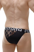 Black lace-trimmed briefs with a bold white PetitQ waistband in the PetitQ tanga Bigoo lace black design